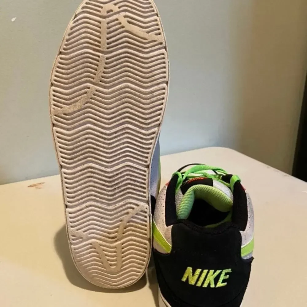 Nike Ruckus Men's 10 Low Beige, Green, Black, White, And Orange Sneakers